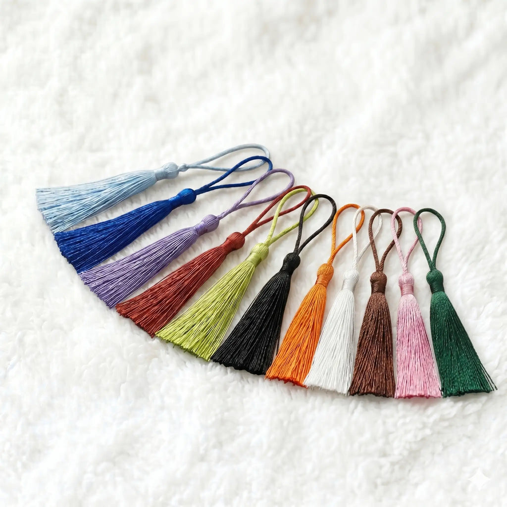 Personalised aluminium bookmark tassel colour options showing multiple premium silky tassel choices