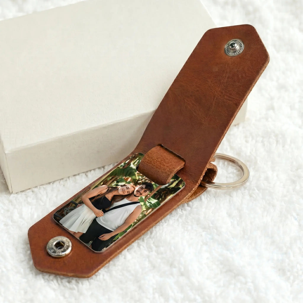 Personalised photo keyring with leather key strap and custom aluminium photo insert featuring family, pet and couple photo examples