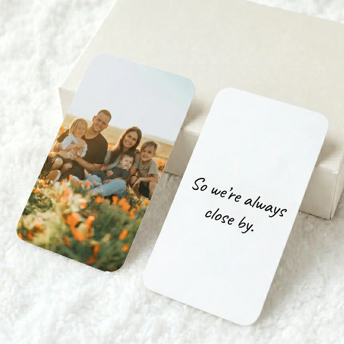 Personalised metal wallet card with custom photo and message, showing double-sided personalisation
