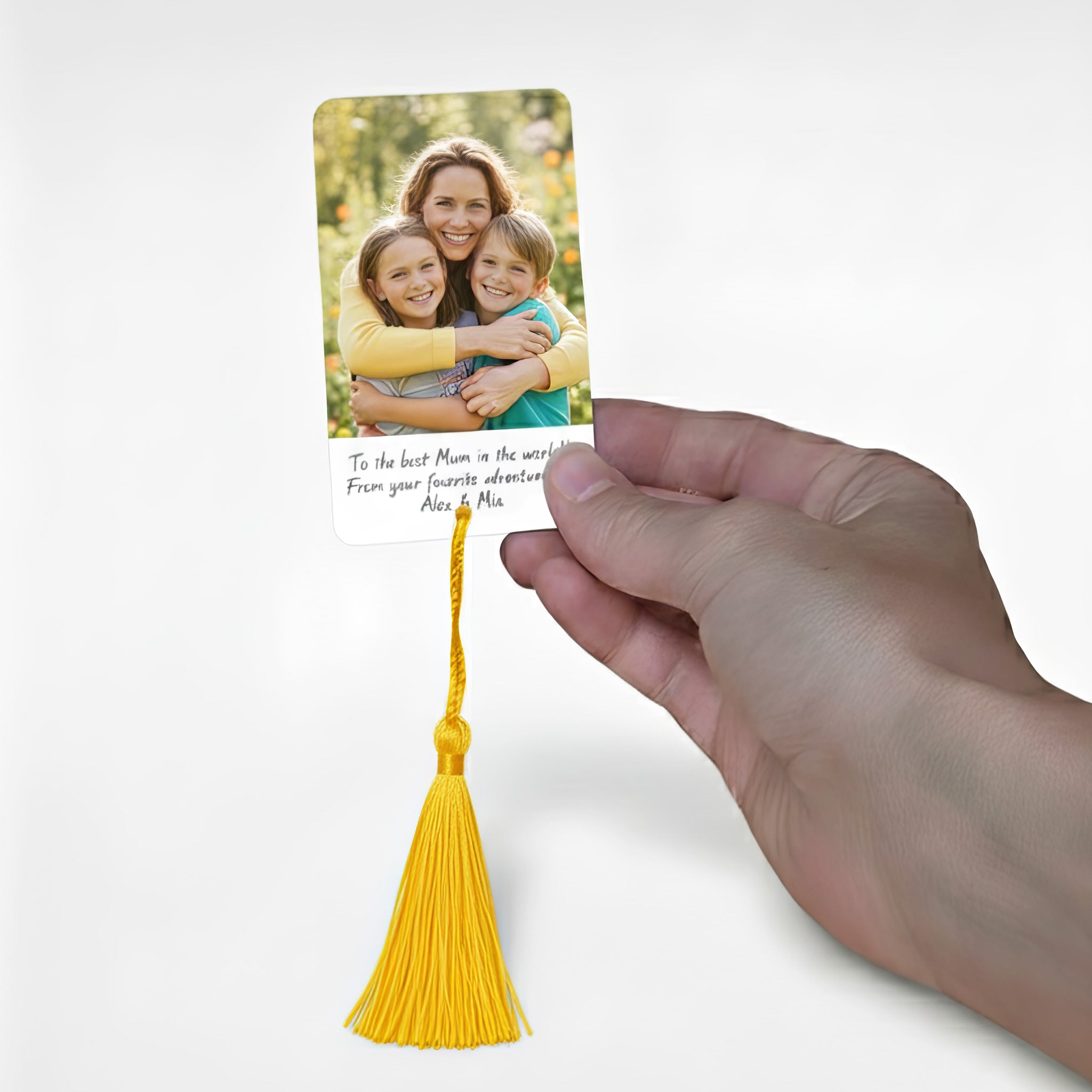 Personalised metal photo bookmark with yellow tassel – custom design featuring a printed family photo and heartfelt message, handmade in the UK. Perfect Mother’s Day gift or keepsake for book lovers and mums who cherish special memories.