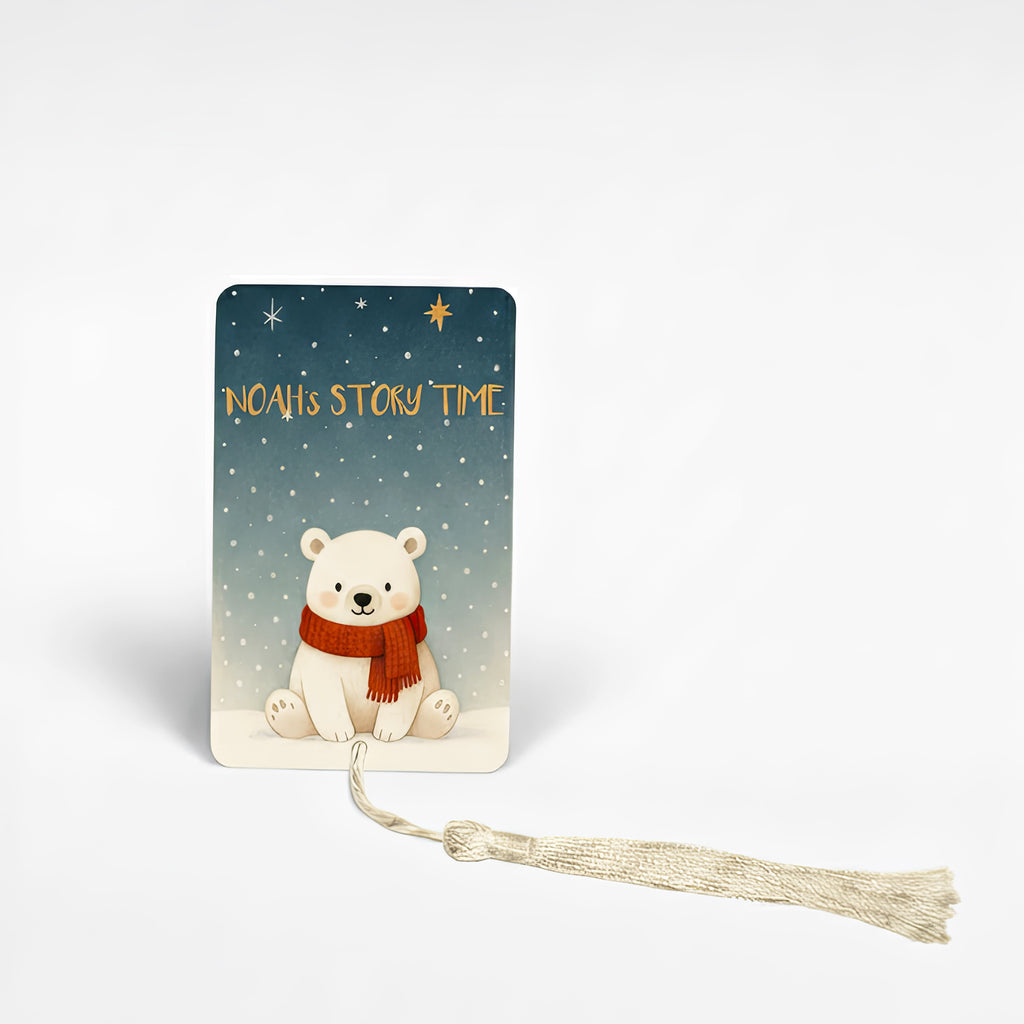 Custom metal bookmark for children featuring a cute polar bear in a red scarf against a snowy winter background with text “Noah’s Story Time” – personalised kids reading accessory handmade in the UK.