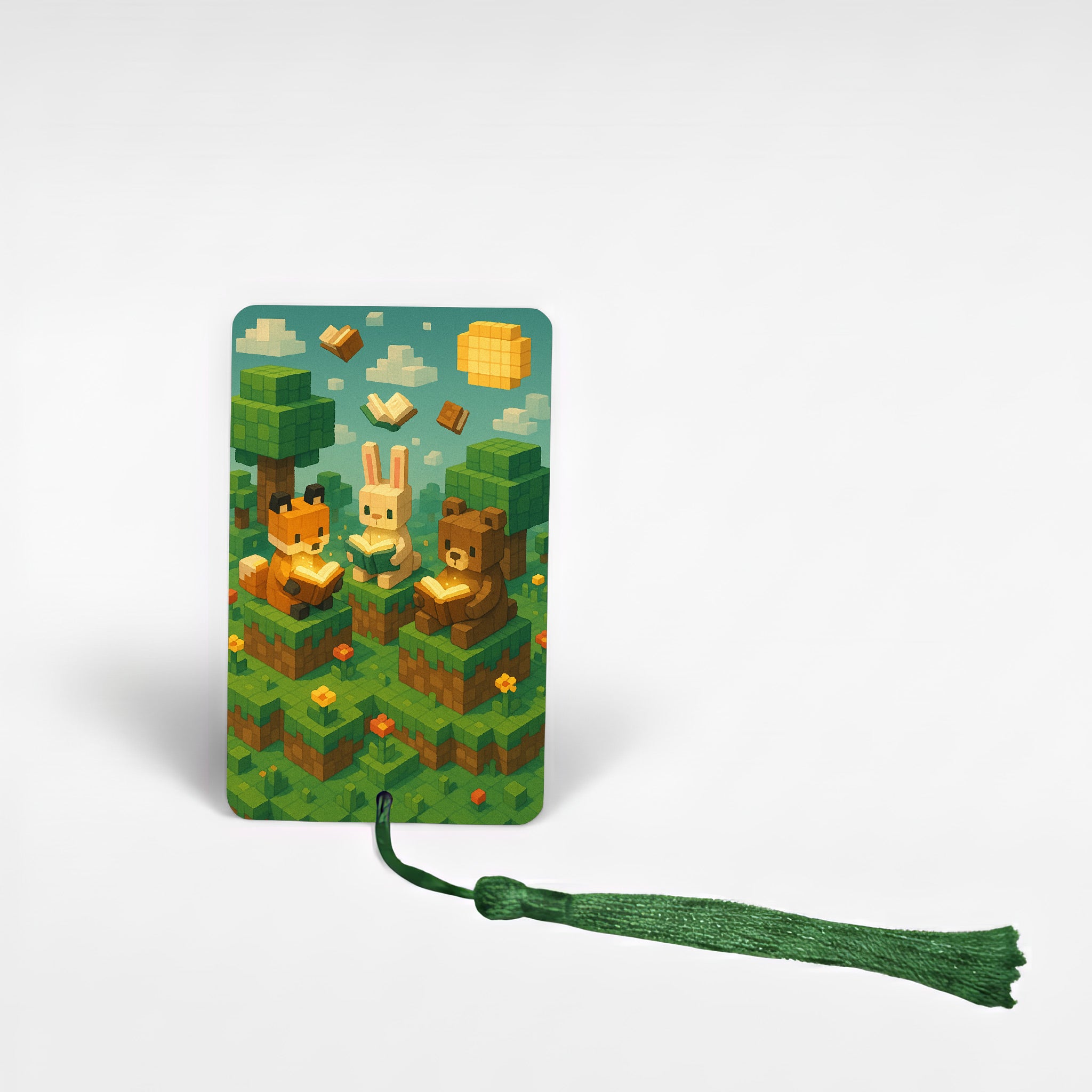 Children’s summer reading adventure metal bookmark featuring pixel art animals – fox, bunny and bear reading outdoors under blue sky – personalised kids bookmark with green tassel handmade in the UK.