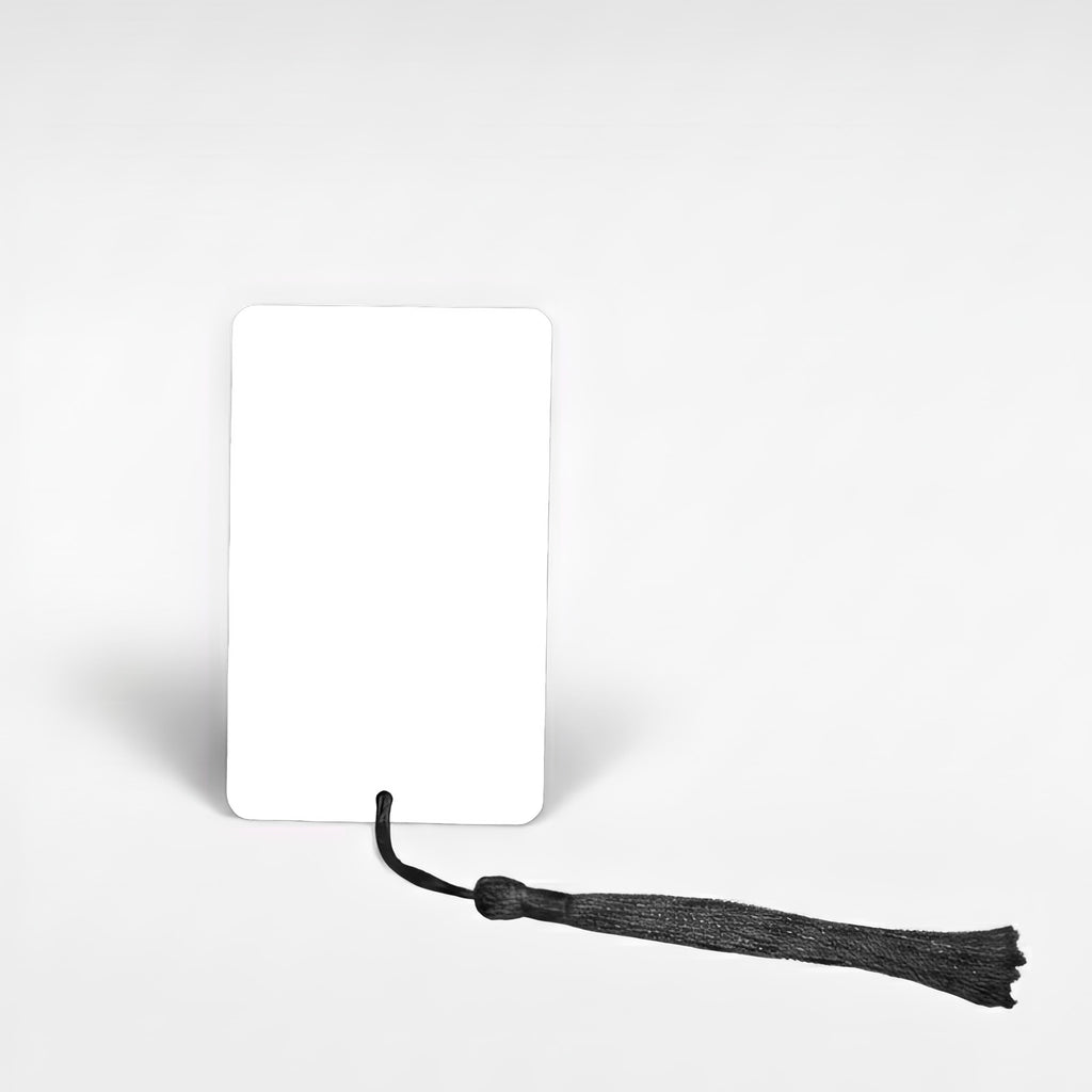Custom aluminium bookmark with black tassel — front view of blank white personalised metal bookmark, made in the UK.