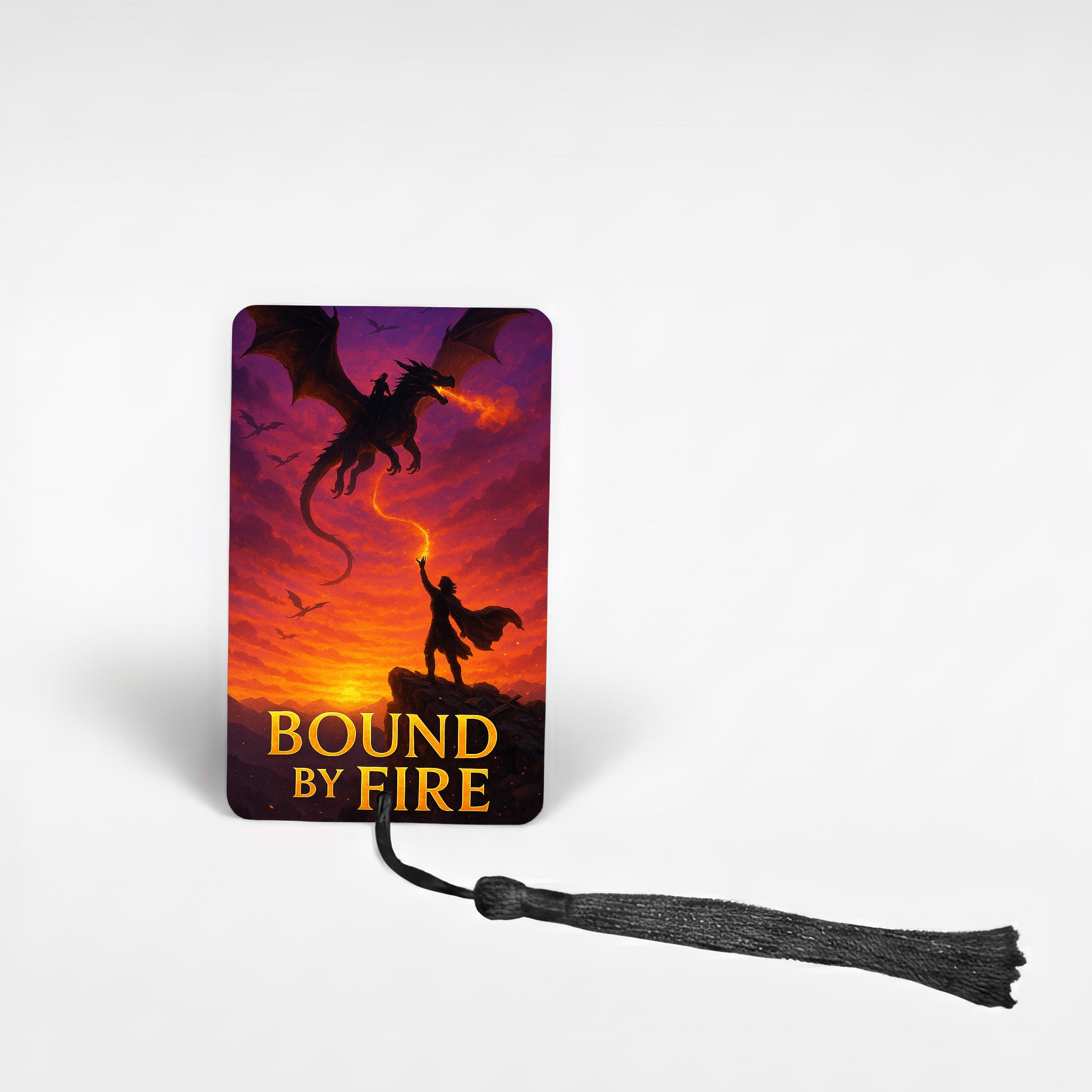 Romantasy metal bookmark featuring dragon rider silhouette at sunset titled “Bound by Fire” with black tassel, fantasy reader gift UK.