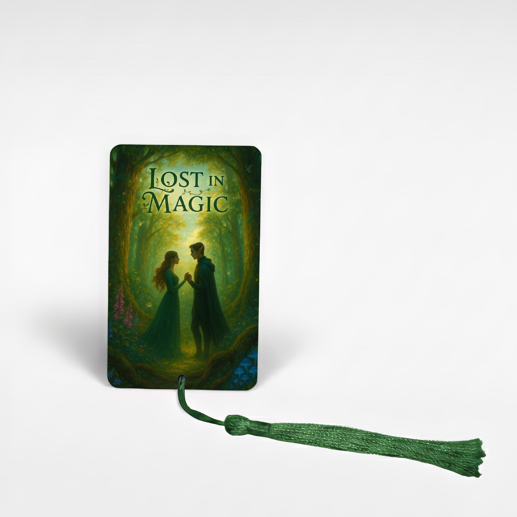 Romantasy metal bookmark with enchanted forest artwork titled “Lost in Magic” showing fae couple, green tassel, handmade fantasy gift UK.